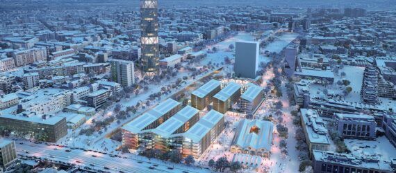 An overhead view of a city with an Olympic Village set up.