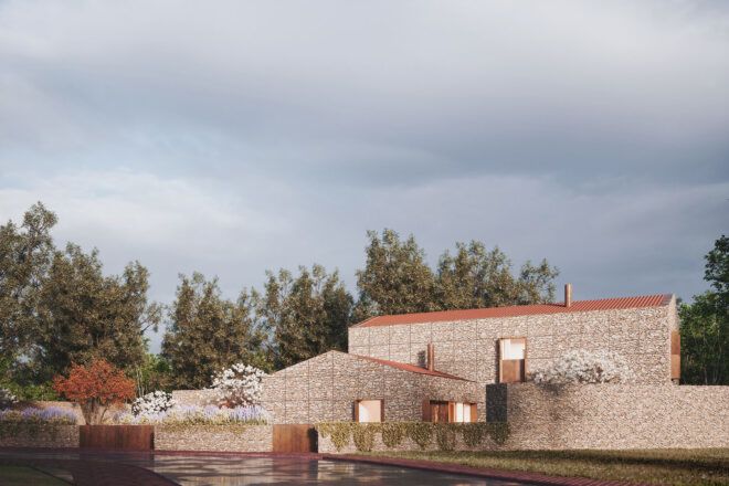 A landscape shot of a home with a beige, natural stone facade and orange tile roof.