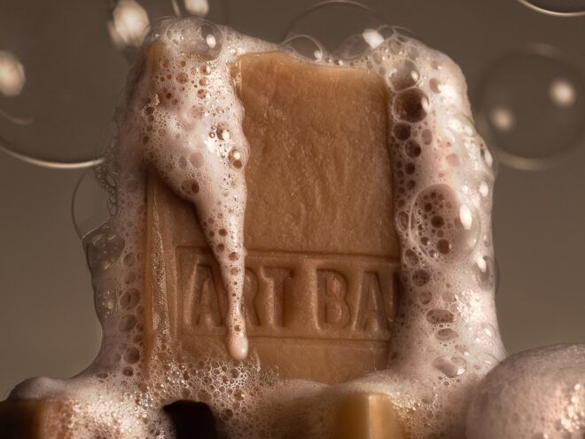 soap suds on brown bar of natural soap