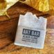 beige soap with label that reads, 