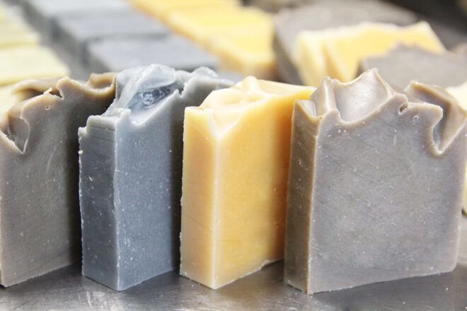vegan natural soaps on steel table