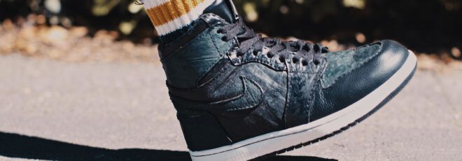 A dark teal sneaker.