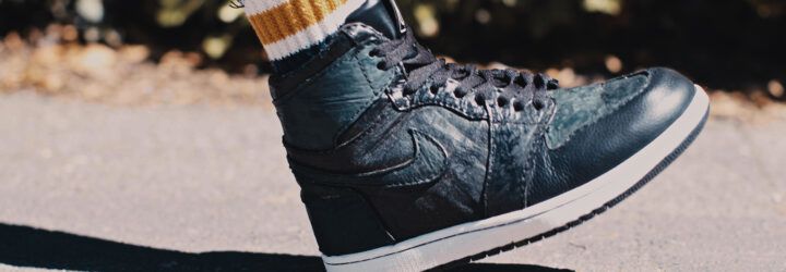 A dark teal sneaker.