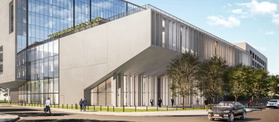 rendering of trees surrounding concrete and glass office building