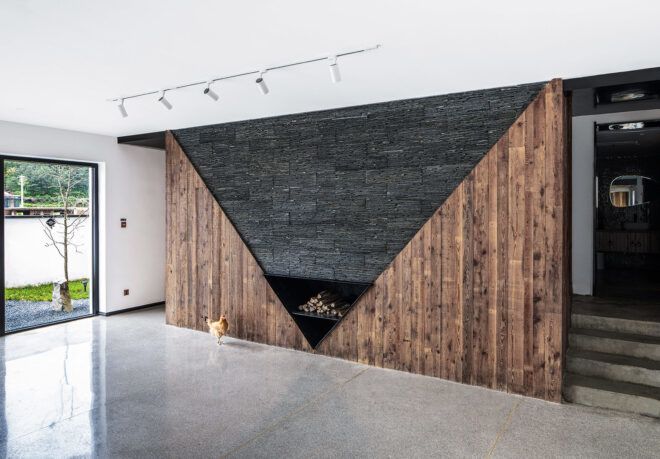 chicken in front of wood and black fireplace