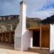 school building with tall white chimney