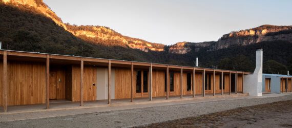 long wood building near mountains