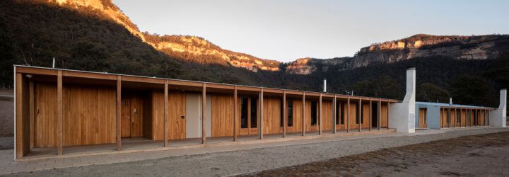 long wood building near mountains