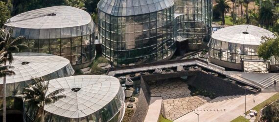 An elevated view of the botanic garden greenhouse buildings.