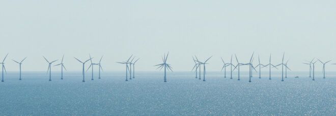 A wind farm in the ocean.