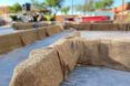 woven tarps over 3D-printed walls