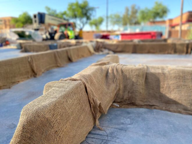 woven tarps over 3D-printed walls