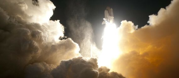 A rocket launching into space.