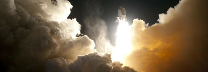 A rocket launching into space.