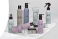 natural skincare and haircare products on white background
