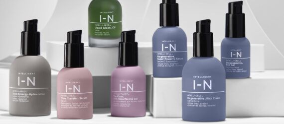 blue, gray and pink hair and skincare bottles on white background