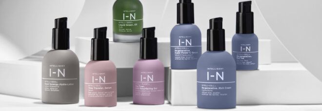 blue, gray and pink hair and skincare bottles on white background