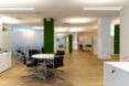 pillars covered in moss inside an office