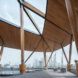 A wooden pavilion on the top floor of the building, overlooking the city.