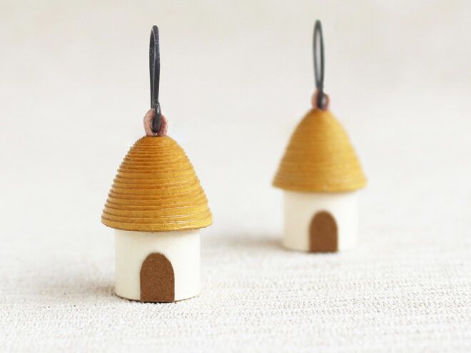 earrings in the shape of cottages