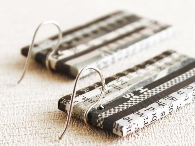 black and white rectangular earrings made of recycled newspapers