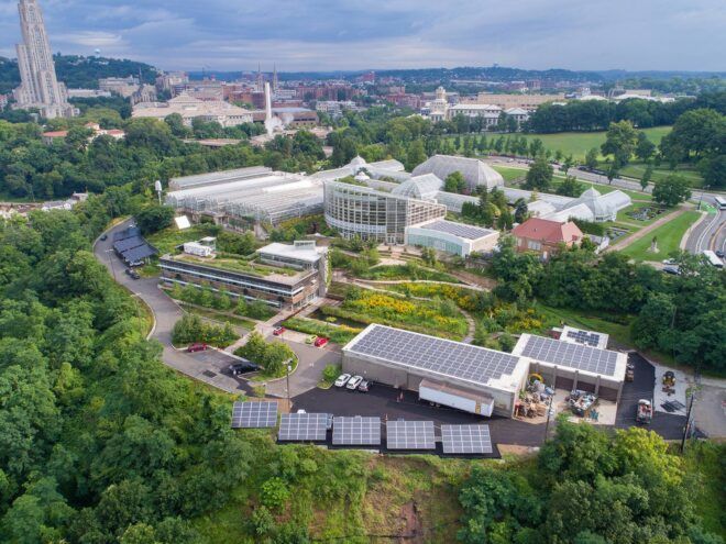 aerial view of Phipps Conservatory campus with botanical gardens and solar-powered buildings