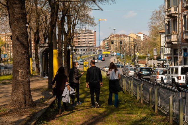 people walking in a linear park in Turin, Italy