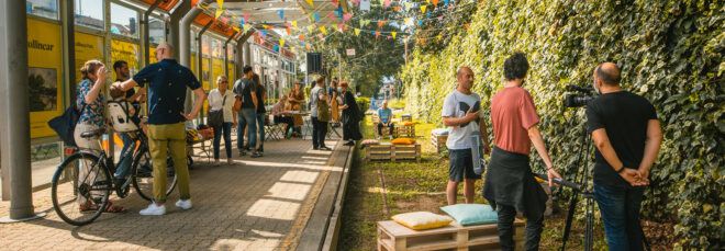 people talking and walking through linear park