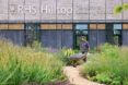 Aiden Couzens, horticulturalist, making final preparations to the Wellbeing Garden at RHS Hilltop.
