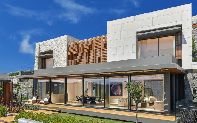 white and wood hotel with glass wall at base