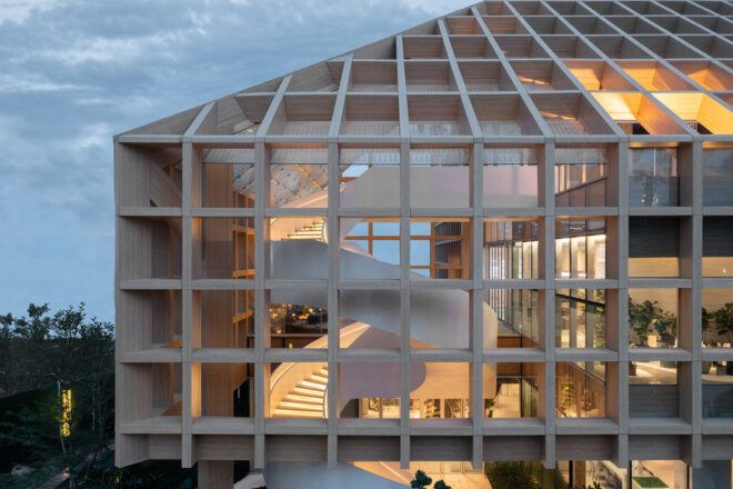 glass building with wood grid facade