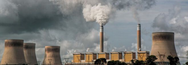 A landscape showing a power plant.