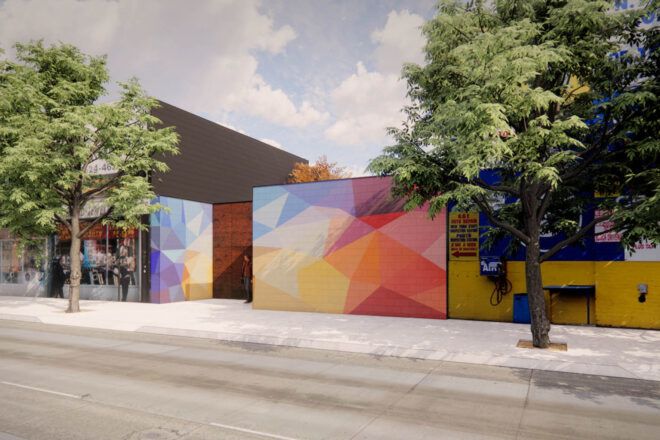 A streetview of a windowless house with a rainbow-colored prism exterior.