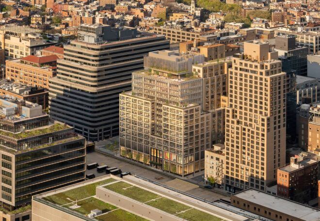 aerial rendering of office tower with plant-filled terraces