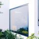 A large square window on the side of the home.