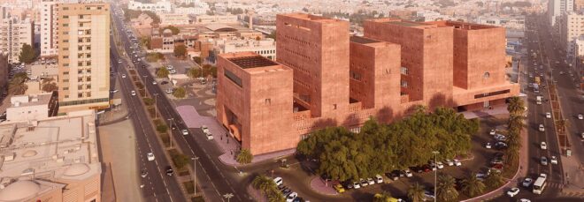An aerial view of a series of interconnected orange buildings.