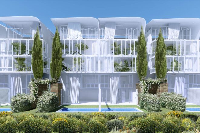 A white box-like structures surrounded by plants, with a pool in front.