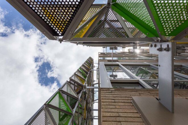 A view looking up at the towering building.
