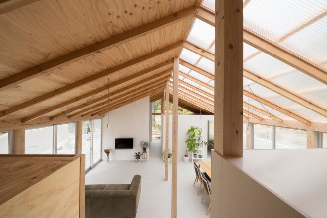 aerial view of white living area with unfinished wood touches
