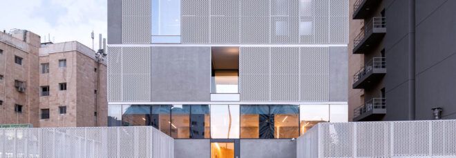 The metal facade of a high-rise building.