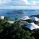 series of buildings with tensile roofs facing the ocean