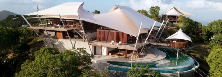 wood home with tensile roofs