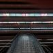 colorful solar panels shining light on vertical farm below