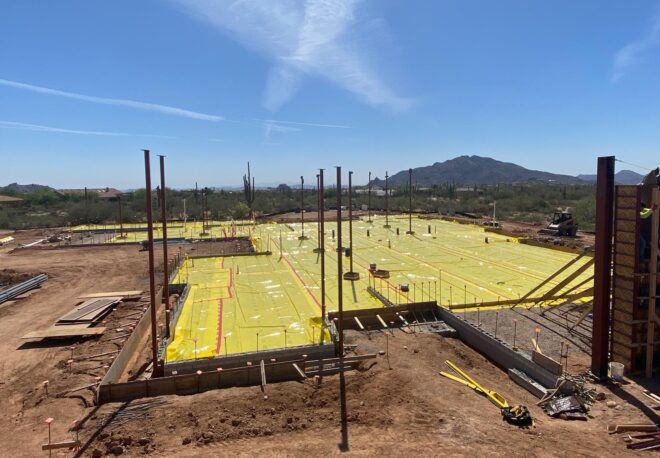 A construction site covered in yellow tarp.