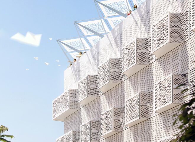 Day view of the Jali ventilation screens and projecting wind catchers that make up the façade.