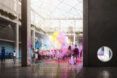 A central court yard bustling with colorful festivities.