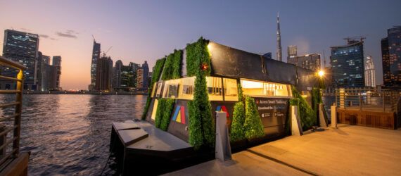Aqua Pod module against the dock in the evening against the Dubai skyline