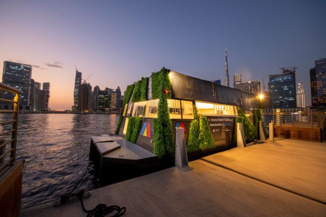 Aqua Pod module against the dock in the evening against the Dubai skyline