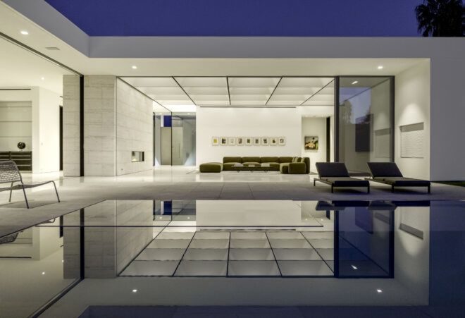 Open living area with a grid of skylights above.