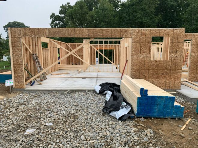 Timber frame and infill of a house under construction